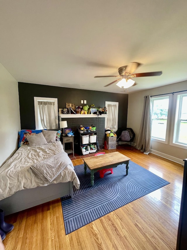 233 Shelton Dr, Saint Joseph, TN 38481 - bedroom featuring wood finished floors and ceiling fan