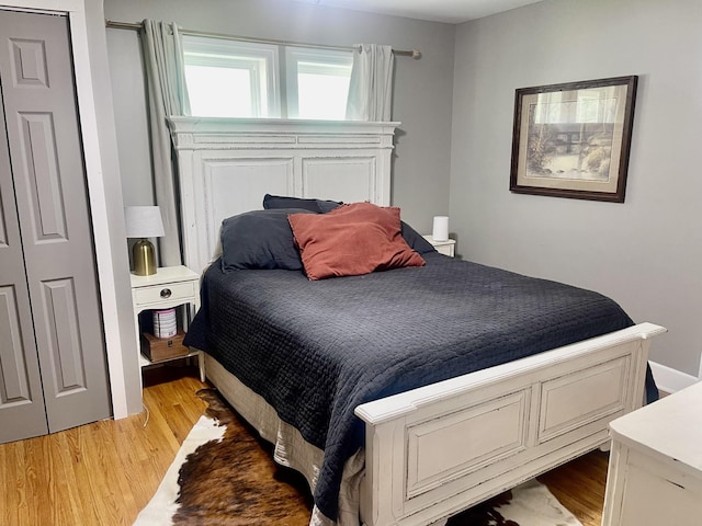 233 Shelton Dr, Saint Joseph, TN 38481 - bedroom featuring light wood-type flooring
