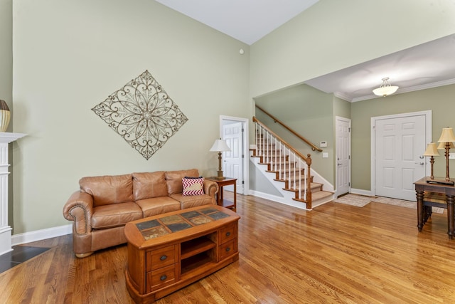 551 Bethany Cir, Murfreesboro, TN 37128 - living room with stairway, wood finished floors, and baseboards