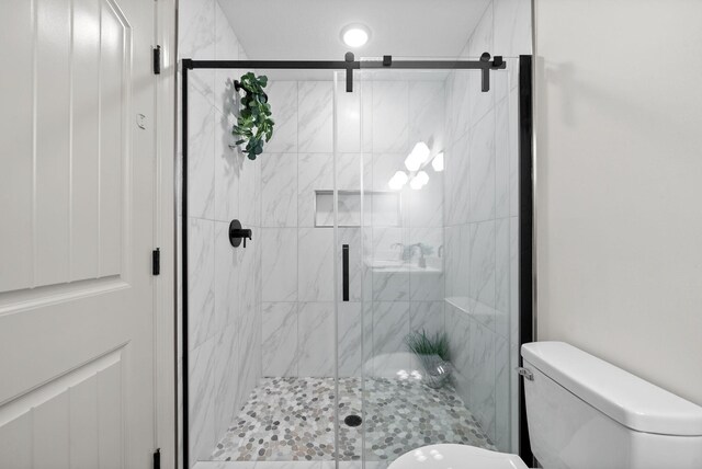1021 Charles Thomas Dr, Clarksville, TN 37042 - bathroom featuring toilet and a shower stall
