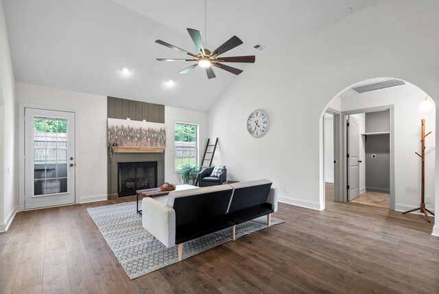 1021 Charles Thomas Dr, Clarksville, TN 37042 - living area with plenty of natural light, arched walkways, ceiling fan, a fireplace, and high vaulted ceiling