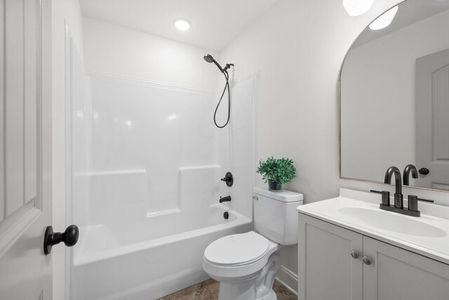 1021 Charles Thomas Dr, Clarksville, TN 37042 - bathroom featuring toilet, vanity, bathtub / shower combination, and baseboards