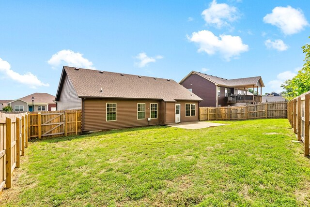 1021 Charles Thomas Dr, Clarksville, TN 37042 - rear view of property featuring a patio and roof with shingles