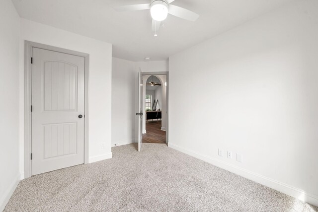 1021 Charles Thomas Dr, Clarksville, TN 37042 - unfurnished bedroom featuring carpet, baseboards, and a ceiling fan