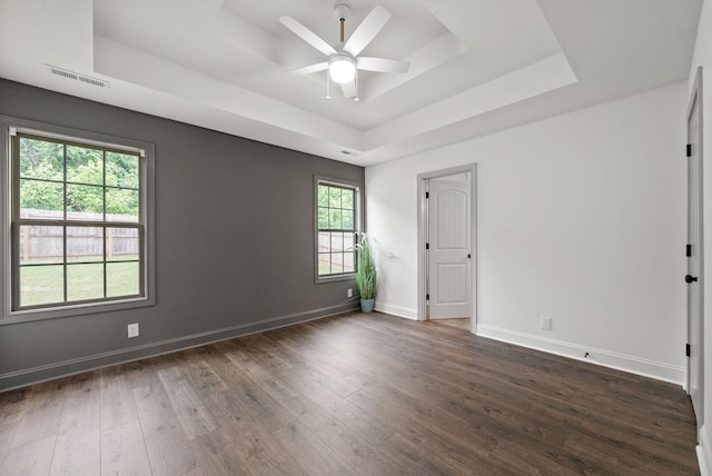 1021 Charles Thomas Dr, Clarksville, TN 37042 - unfurnished room featuring a raised ceiling, a ceiling fan, dark wood-style flooring, and baseboards