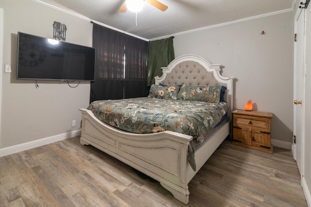 104 3rd Ave NW, Winchester, TN 37398 - bedroom with baseboards, wood finished floors, ornamental molding, and a ceiling fan