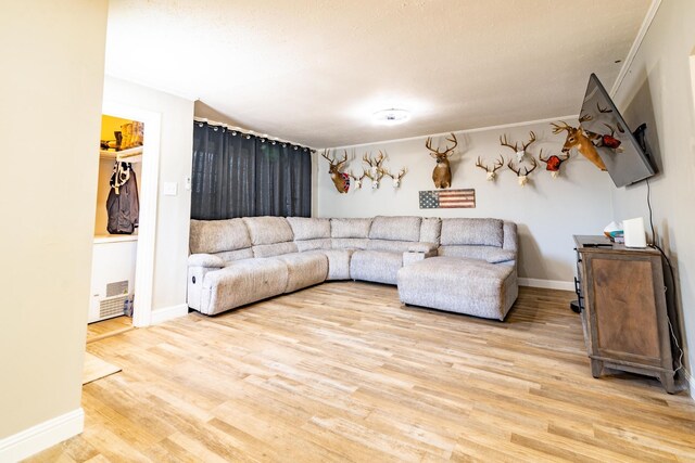 104 3rd Ave NW, Winchester, TN 37398 - living area with light wood-style floors and baseboards