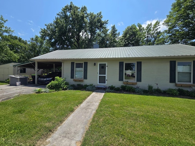 163 Bryan Ave, La Fayette, KY 42254 - ranch-style house featuring driveway, a front yard, metal roof, and an attached carport