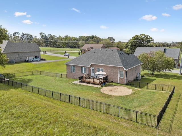 1007 Fairways Dr, Greenbrier, TN 37073 - back of house with a deck, brick siding, roof with shingles, and a fenced backyard