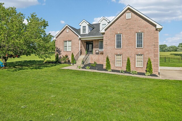 1007 Fairways Dr, Greenbrier, TN 37073 - view of front facade featuring brick siding