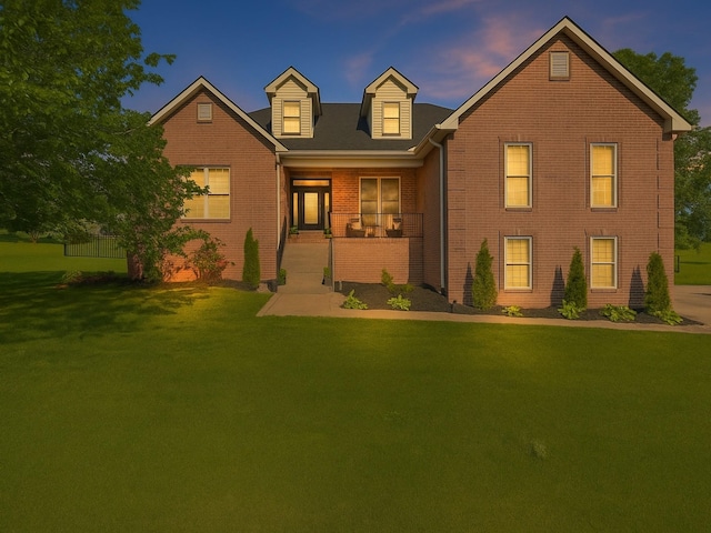 1007 Fairways Dr, Greenbrier, TN 37073 - view of front of property featuring brick siding and a lawn