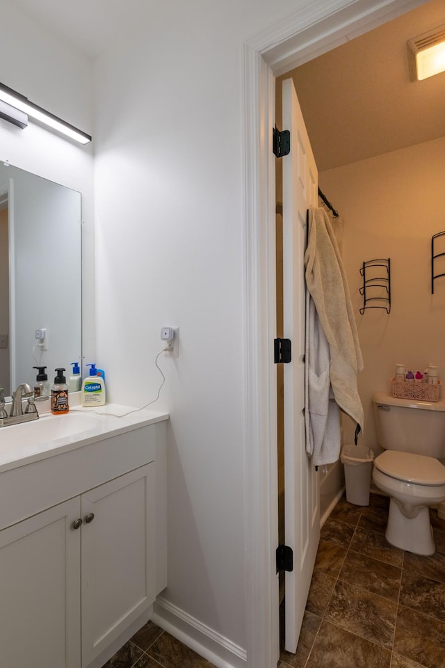 2659 Cave Springs Rd, Springfield, TN 37172 - bathroom with toilet, baseboards, vanity, and curtained shower
