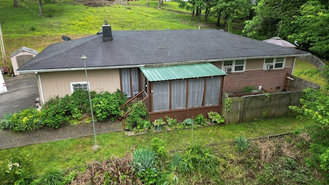 131 Scott Rd, Harriman, TN 37748 - rear view of property featuring a chimney, roof with shingles, and brick siding