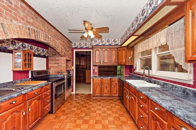 103 Colwell Ln, Manchester, TN 37355 - kitchen with stainless steel electric stove, a sink, a textured ceiling, oven, and ceiling fan