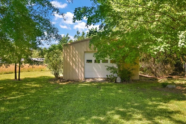 103 Colwell Ln, Manchester, TN 37355 - view of green lawn with an outdoor structure and a detached garage