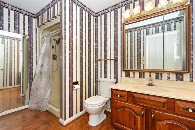 103 Colwell Ln, Manchester, TN 37355 - full bathroom featuring a shower stall, vanity, toilet, and baseboards