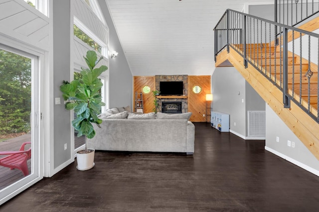 462 Clifford Dykes Rd, Tracy City, TN 37387 - living room with high vaulted ceiling, baseboards, stairs, a fireplace, and wood finished floors