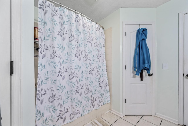 155 Deer Cir, Estill Springs, TN 37330 - full bath with tile patterned floors, a shower with curtain, and baseboards