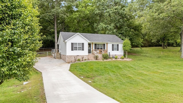 155 Deer Cir, Estill Springs, TN 37330 - view of front of home with concrete driveway, a porch, a front yard, and crawl space