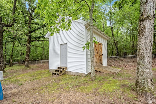155 Deer Cir, Estill Springs, TN 37330 - view of outdoor structure with entry steps, fence, and an outbuilding