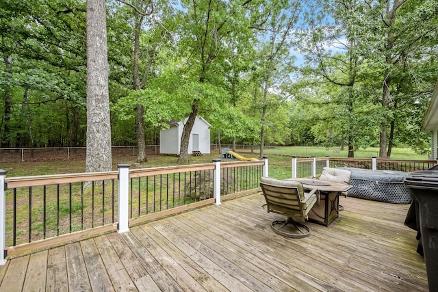 155 Deer Cir, Estill Springs, TN 37330 - wooden terrace featuring an outbuilding, a shed, and view of wooded area