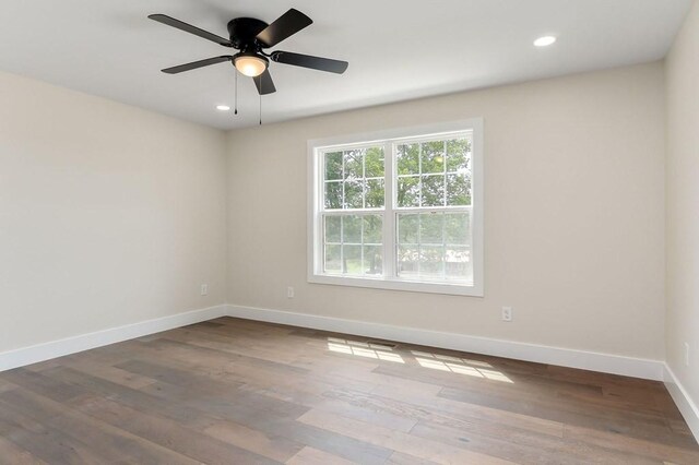 7803 Monterey Hwy, Sparta, TN 38583 - unfurnished room with baseboards, recessed lighting, wood finished floors, and ceiling fan