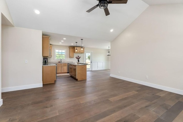 7803 Monterey Hwy, Sparta, TN 38583 - kitchen with vaulted ceiling, ceiling fan, open floor plan, a center island, and light countertops