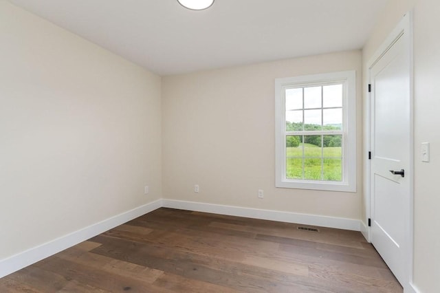 7803 Monterey Hwy, Sparta, TN 38583 - empty room with baseboards and dark wood-style floors