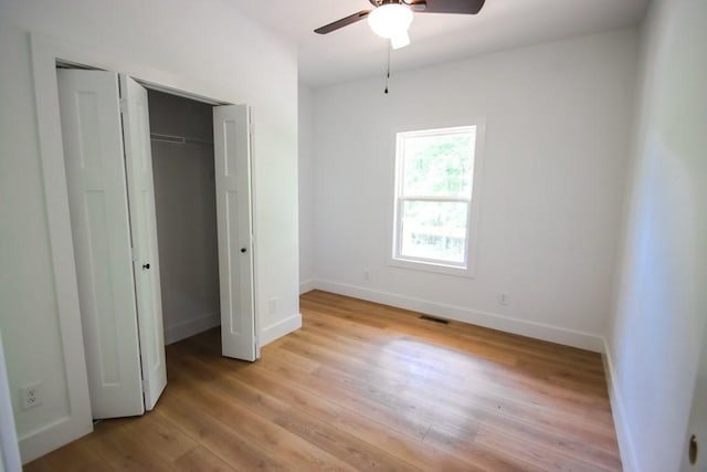 70 River Oaks Dr, Sparta, TN 38583 - unfurnished bedroom featuring light wood-style floors, baseboards, and a ceiling fan