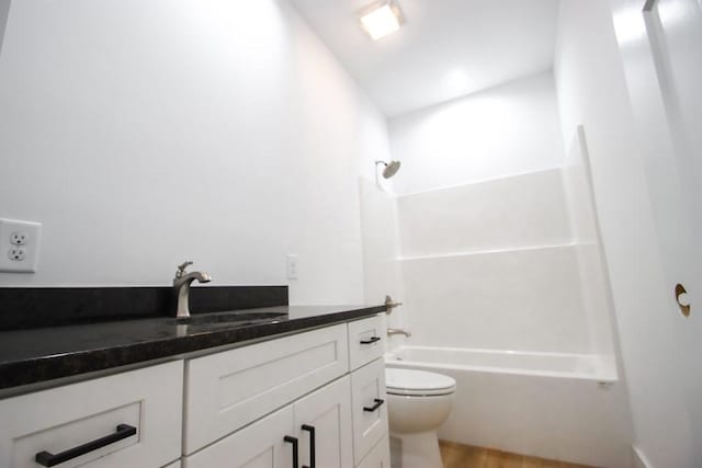 70 River Oaks Dr, Sparta, TN 38583 - full bath featuring toilet, vanity, shower / bathtub combination, and wood finished floors