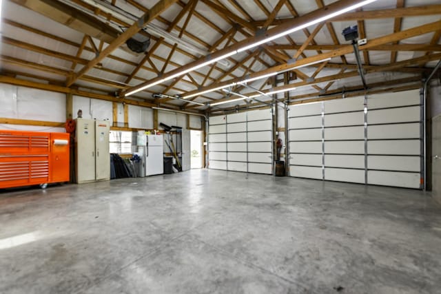 1383 Smith Chapel Rd, Shelbyville, TN 37160 - garage with freestanding refrigerator