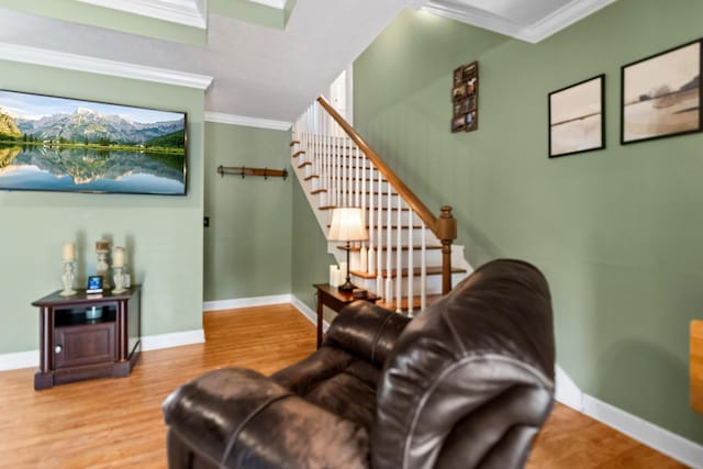 1383 Smith Chapel Rd, Shelbyville, TN 37160 - living area with crown molding, stairway, wood finished floors, and baseboards