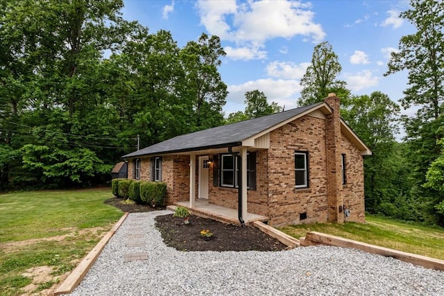 1079 Hillcrest Rd, Waverly, TN 37185 - ranch-style house featuring a chimney, crawl space, a front yard, covered porch, and brick siding