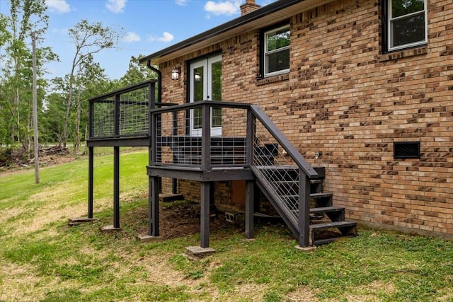 1079 Hillcrest Rd, Waverly, TN 37185 - view of play area with a wooden deck, a yard, and stairway