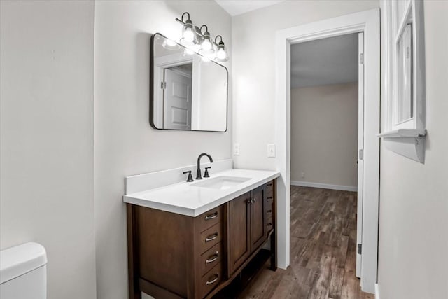 1079 Hillcrest Rd, Waverly, TN 37185 - bathroom featuring wood finished floors, vanity, and toilet
