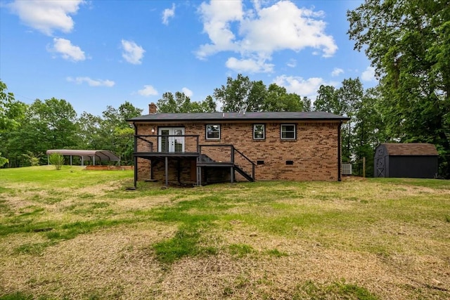 1079 Hillcrest Rd, Waverly, TN 37185 - rear view of house with stairs, a storage unit, a lawn, a chimney, and an outbuilding