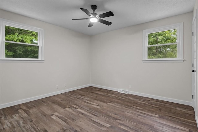 1079 Hillcrest Rd, Waverly, TN 37185 - spare room with plenty of natural light, wood finished floors, and baseboards