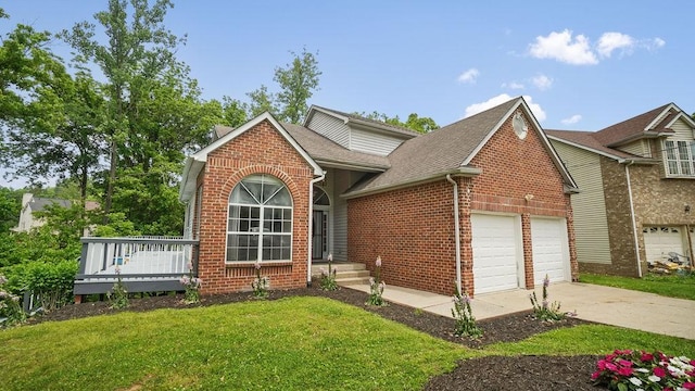 517 Eversholt Ct, Antioch, TN 37013 - view of front of house featuring brick siding, roof with shingles, a garage, a front yard, and concrete driveway
