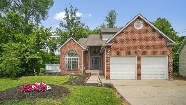 517 Eversholt Ct, Antioch, TN 37013 - traditional-style house with driveway, brick siding, an attached garage, a front lawn, and roof with shingles