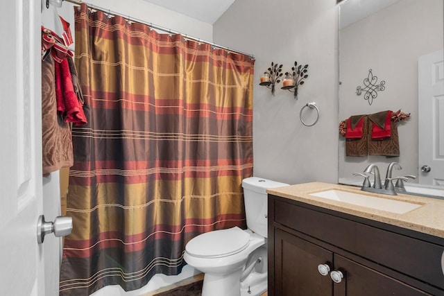 517 Eversholt Ct, Antioch, TN 37013 - full bathroom featuring toilet, vanity, and curtained shower