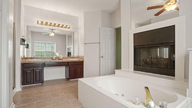 517 Eversholt Ct, Antioch, TN 37013 - full bath with a ceiling fan, a tub with jets, vanity, and tile patterned flooring