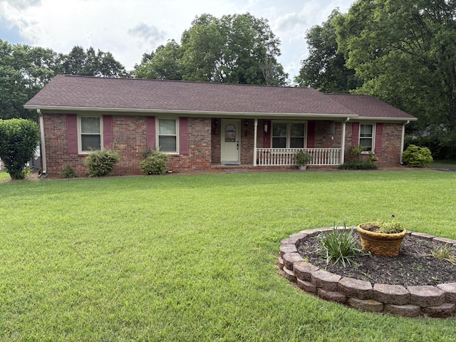 4321 Harley Way, Murfreesboro, TN 37129 - ranch-style home featuring a porch, brick siding, a front yard, and roof with shingles