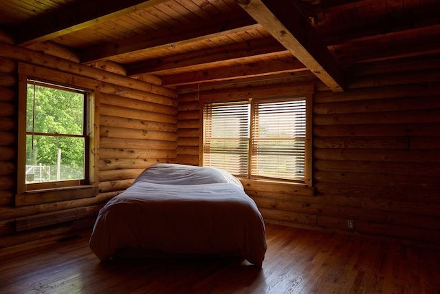 1794 Mosley Ferry Rd, Chapmansboro, TN 37035 - bedroom with wooden ceiling, beamed ceiling, multiple windows, hardwood / wood-style floors, and log walls