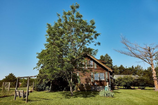 1794 Mosley Ferry Rd, Chapmansboro, TN 37035 - view of side of home with a lawn