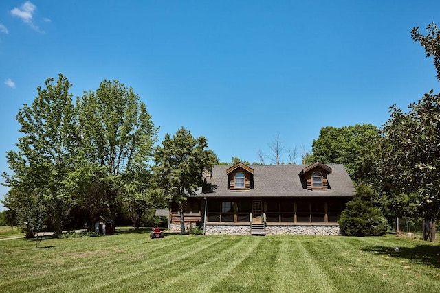 1794 Mosley Ferry Rd, Chapmansboro, TN 37035 - view of front of home featuring a front lawn and a sunroom
