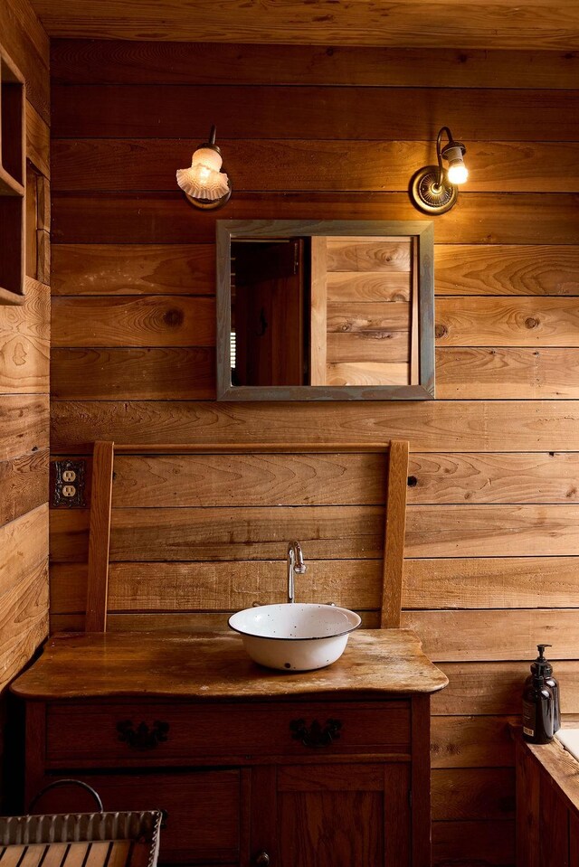 1794 Mosley Ferry Rd, Chapmansboro, TN 37035 - bathroom with wooden walls and vanity