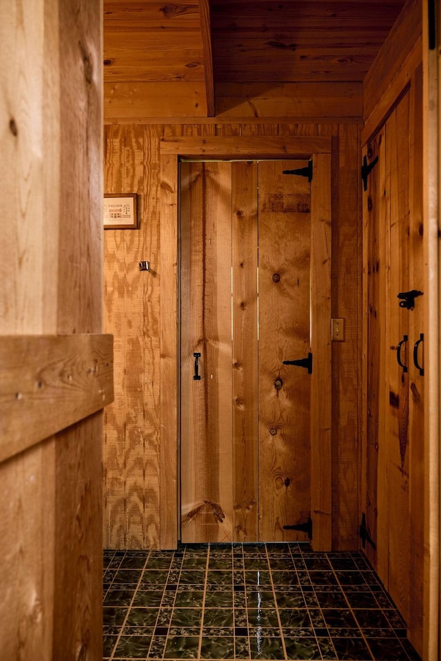 1794 Mosley Ferry Rd, Chapmansboro, TN 37035 - hall with wooden ceiling and wooden walls