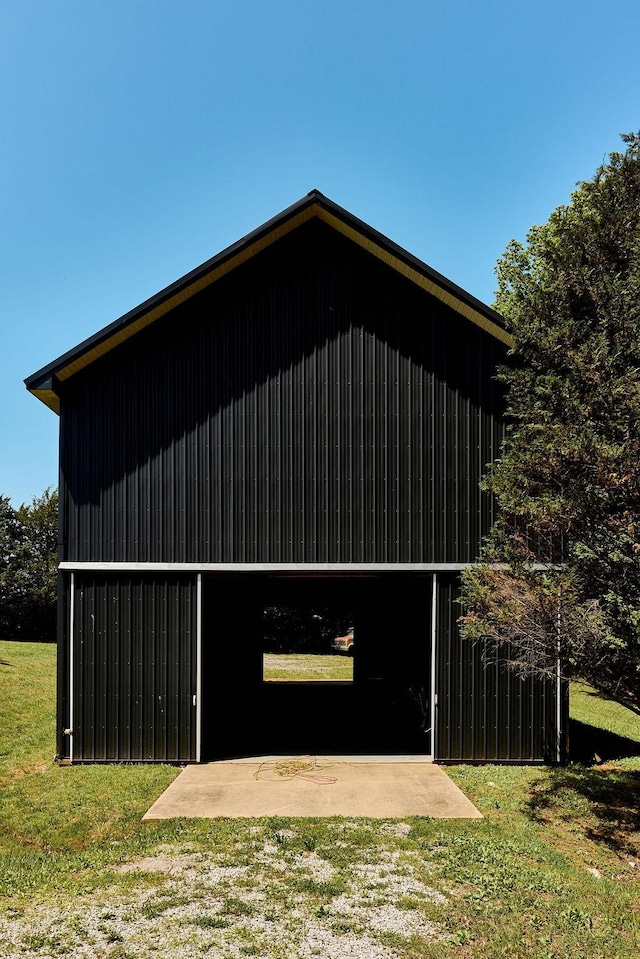 1794 Mosley Ferry Rd, Chapmansboro, TN 37035 - view of pole building with a yard