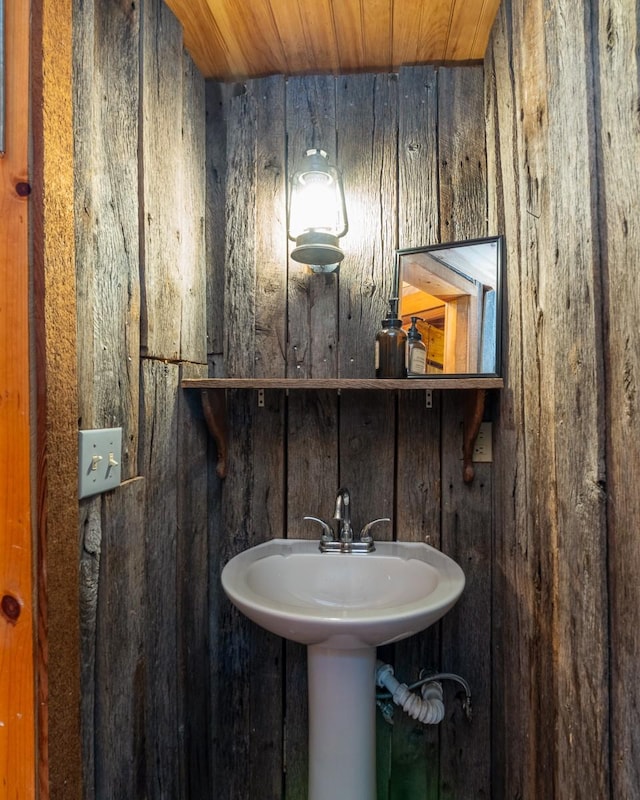 1794 Mosley Ferry Rd, Chapmansboro, TN 37035 - bathroom with wood walls and wood ceiling