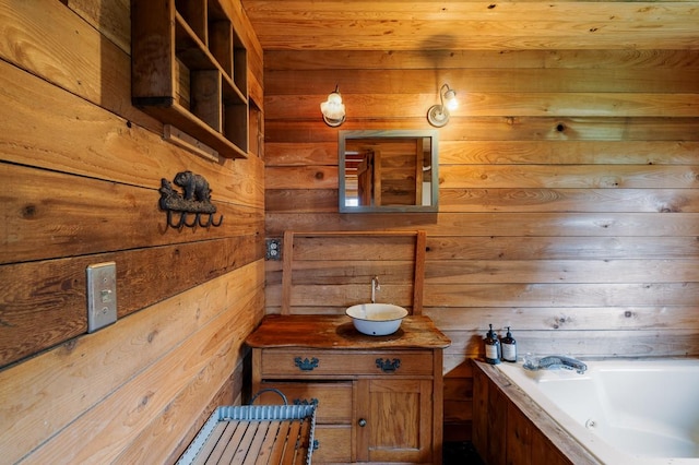 1794 Mosley Ferry Rd, Chapmansboro, TN 37035 - full bath featuring a jetted tub, vanity, and wooden walls